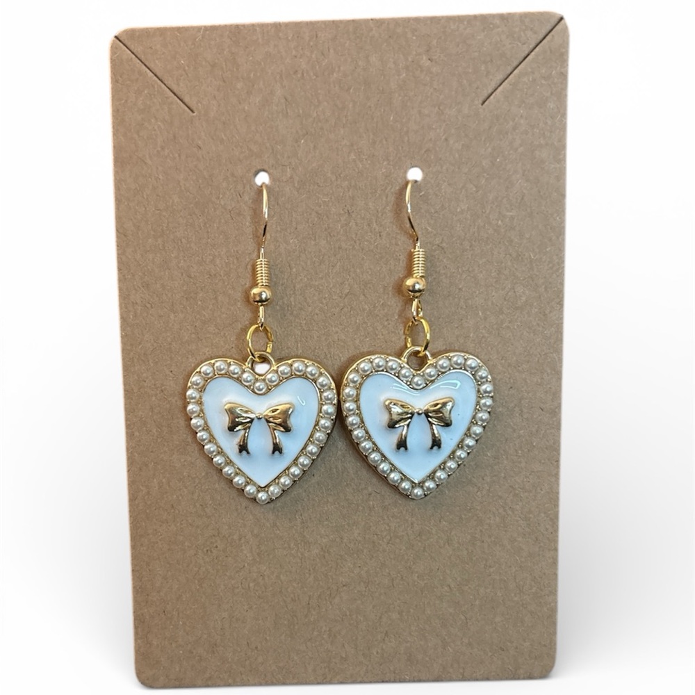 Handmade Gold and White Enameled Heart Earrings with Bow Accent - Picture 2 of 2